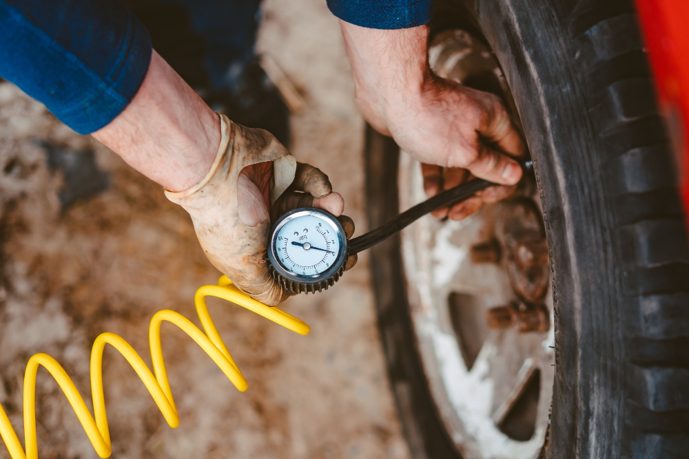 a man check air pressure psi 